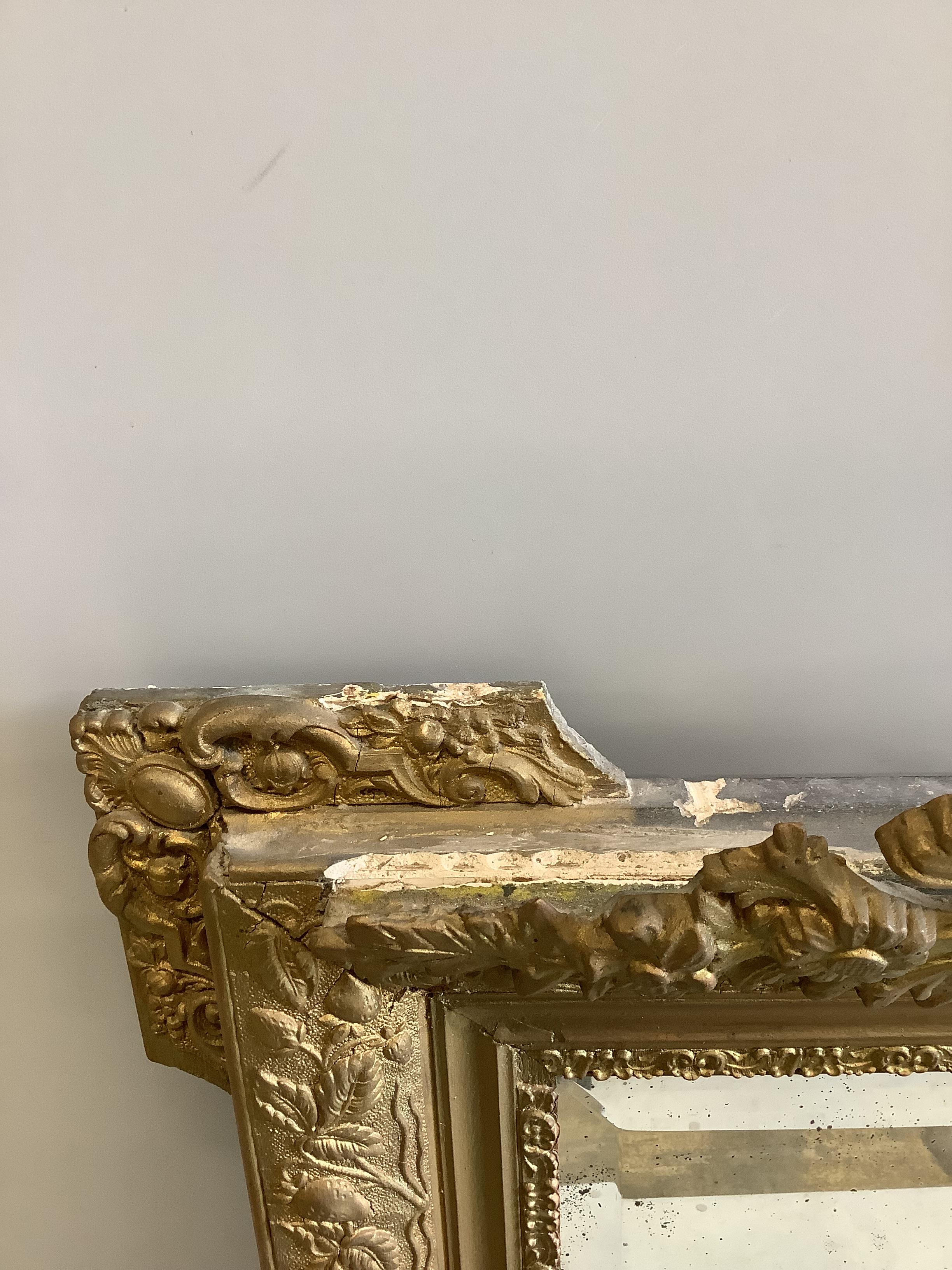 A late 19th century French giltwood and composition wall mirror, re-painted, width 81cm, height 122cm
